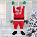 Santa Claus Climbs The Wall To Decorate Clothes
