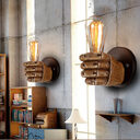 Fist resin wall lamp creates decorative