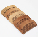 Peach wood comb advertising small wooden hair massage