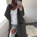 Double pocket full body twist sweater