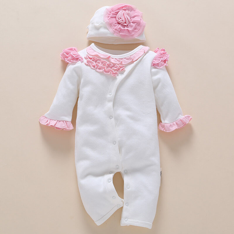 one-year-old baby wears newborn clothing romper jumpsuit