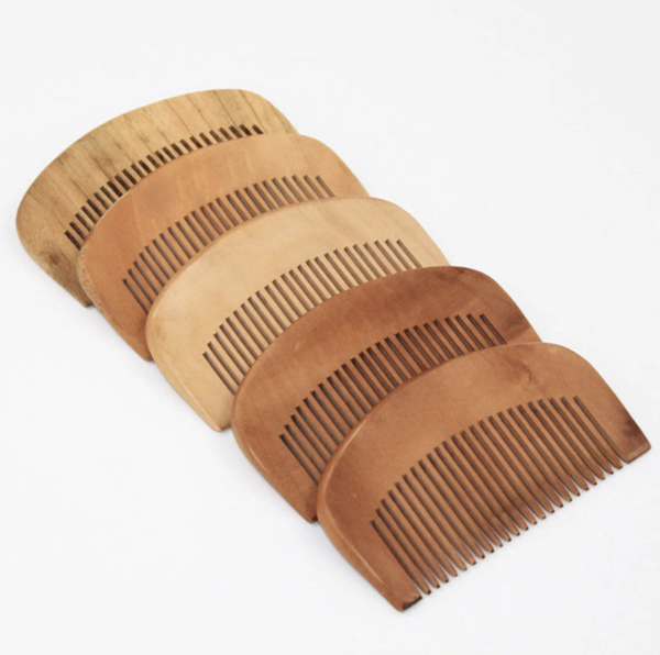 Peach wood comb advertising small wooden hair massage