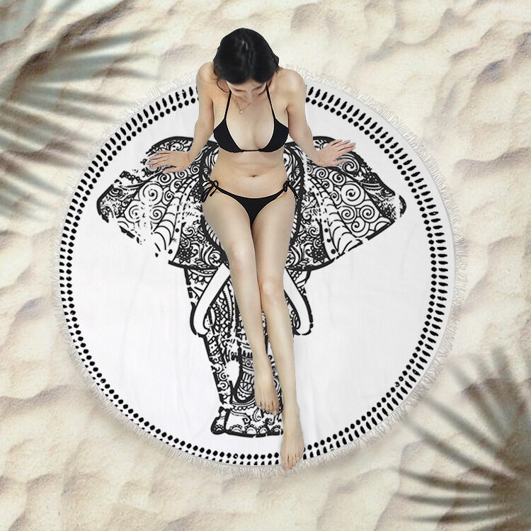 Fringed beach towel round bath